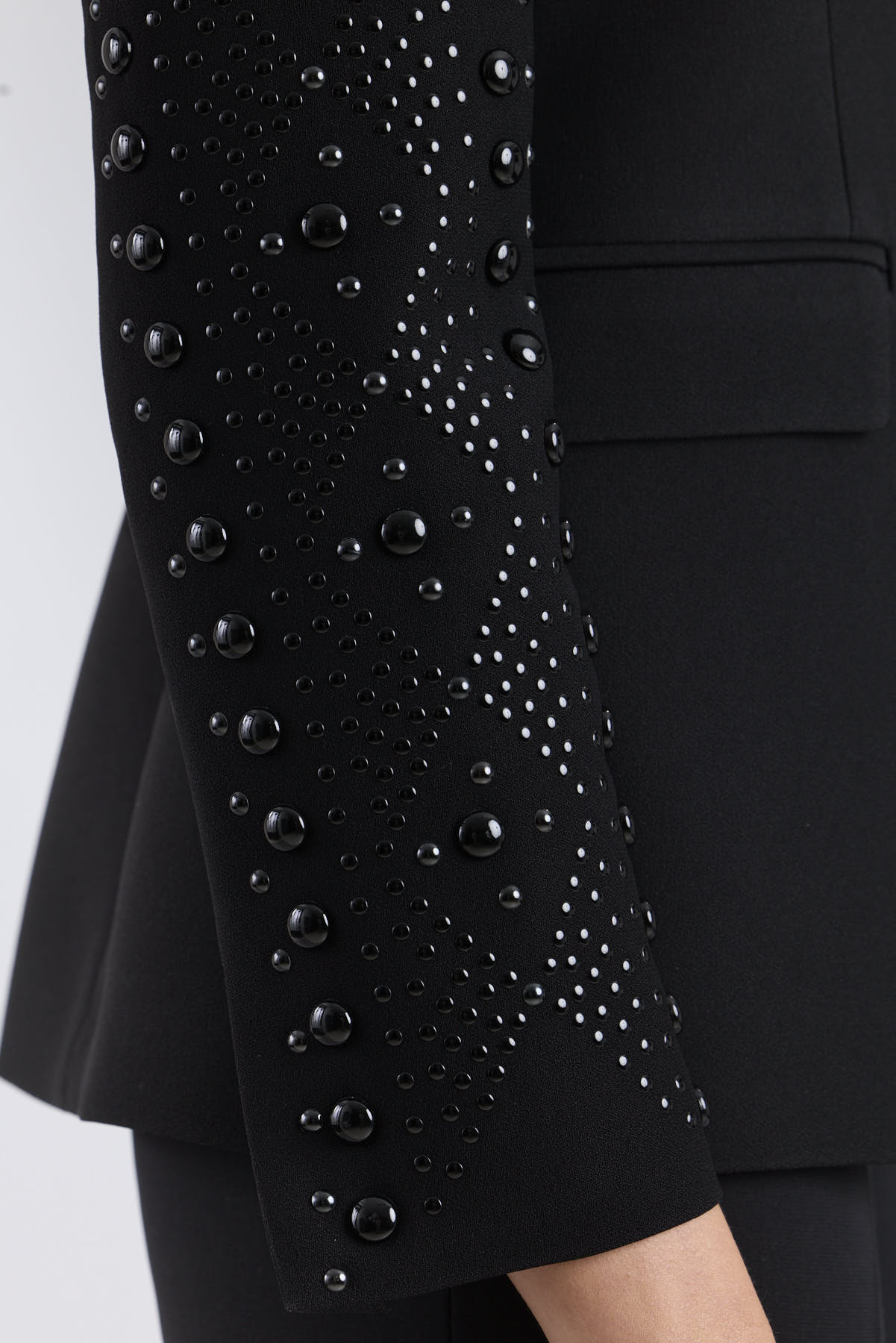 Women’s Lord Byron black tailored blazer with hand-applied metallic studs along the lapels and pockets.