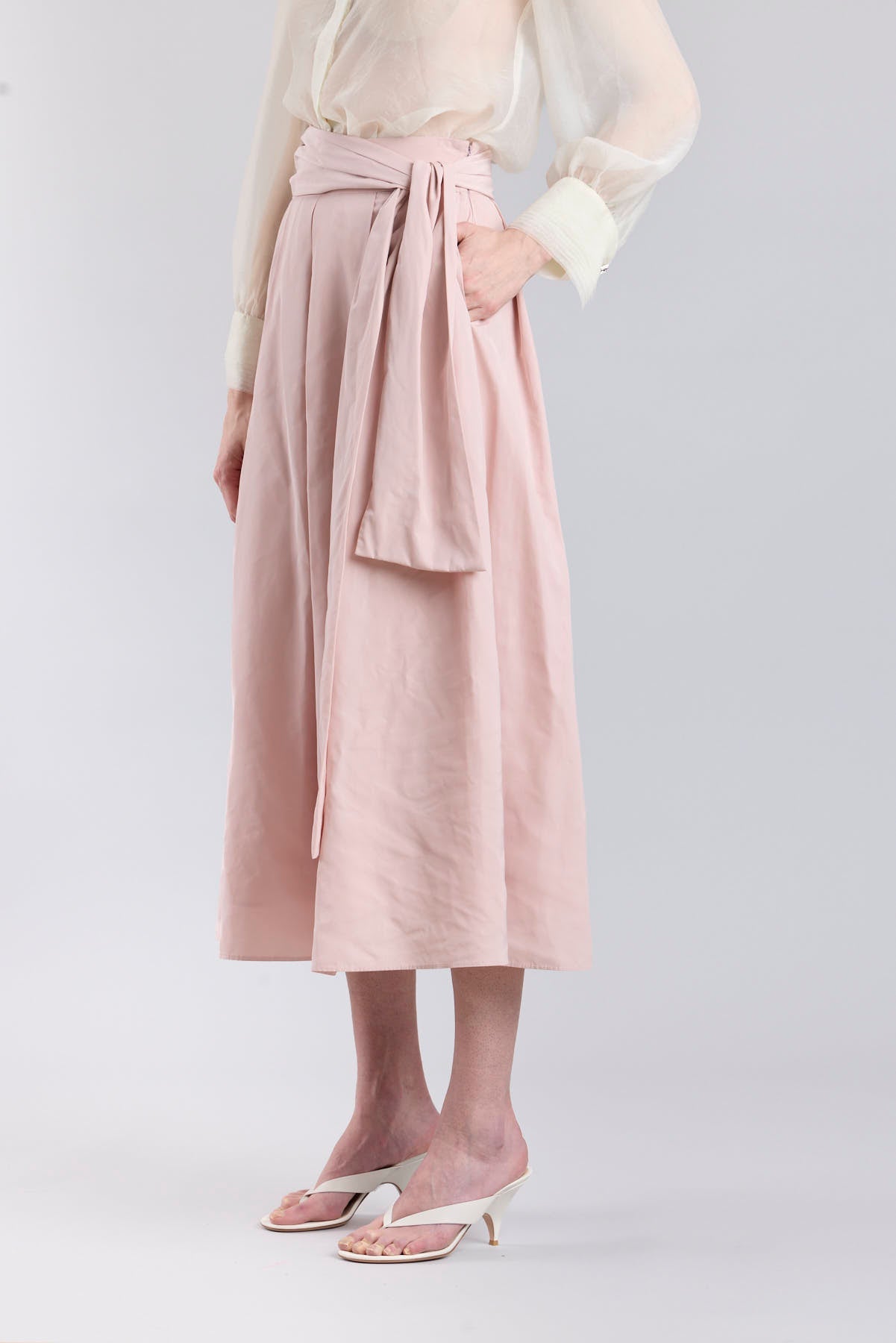 Structured dusty pink midi skirt with volume and waist bow detail by The Extreme Collection.