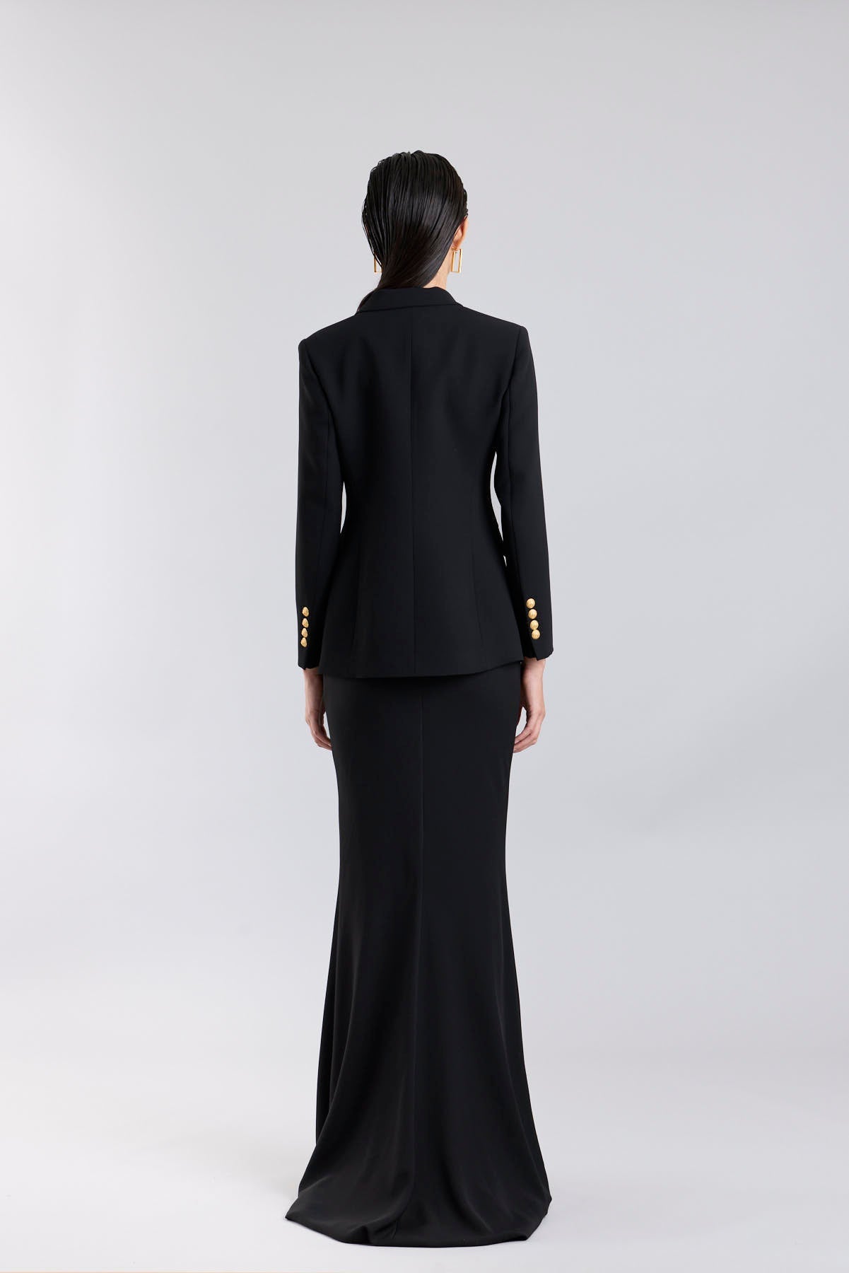 Women’s Iconic Code 01 designer double-breasted blazer in black with optical white peak lapels and gold heraldic buttons.